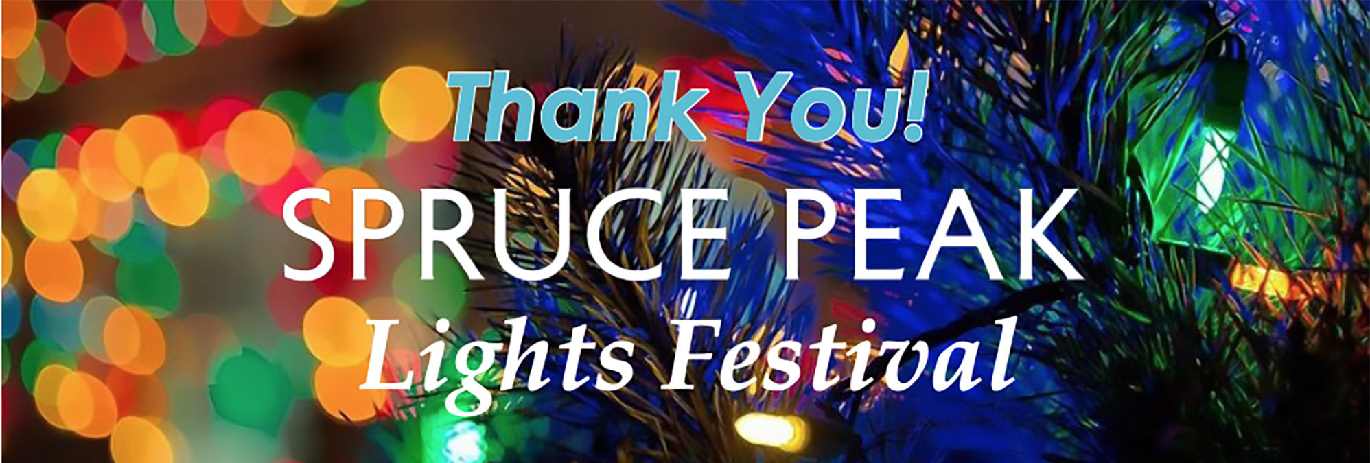 Blurred image of Christmas tree with lights and Thank You Spruce Peak Lights Festival white type