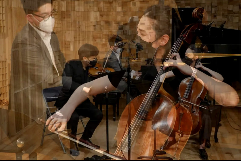 Layered abstract photo from the livestream performance with Jia Kim playing cello, Euntaek Kim playing piano and Siwoo Kim playing violin.